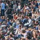 people sitting on stadium